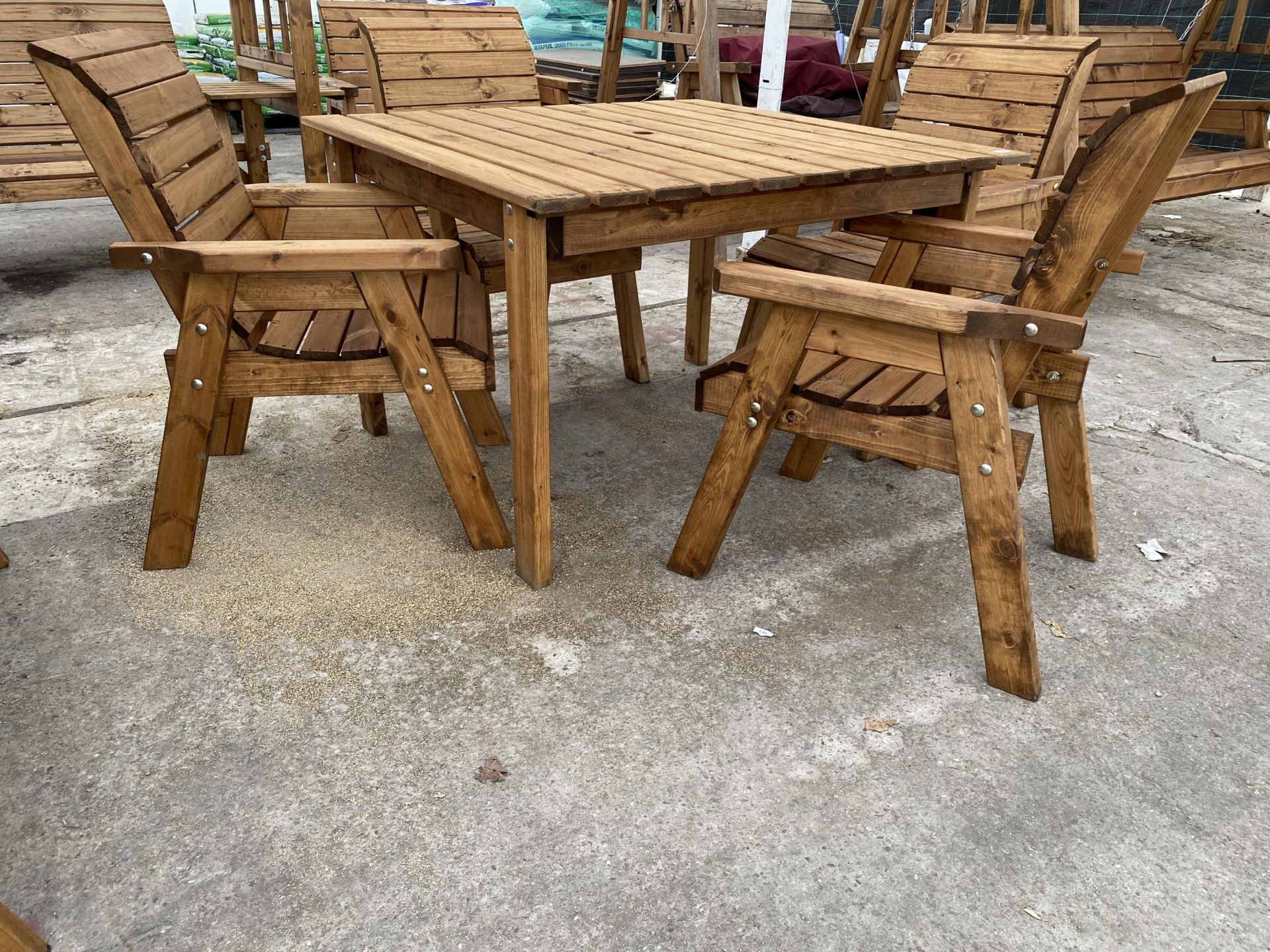 AN AS NEW EX DISPLAY CHARLES TAYLOR PATIO FURNITURE SET COMPRISING OF A SQUARE TABLE AND FOUR CHAIRS - Image 2 of 2