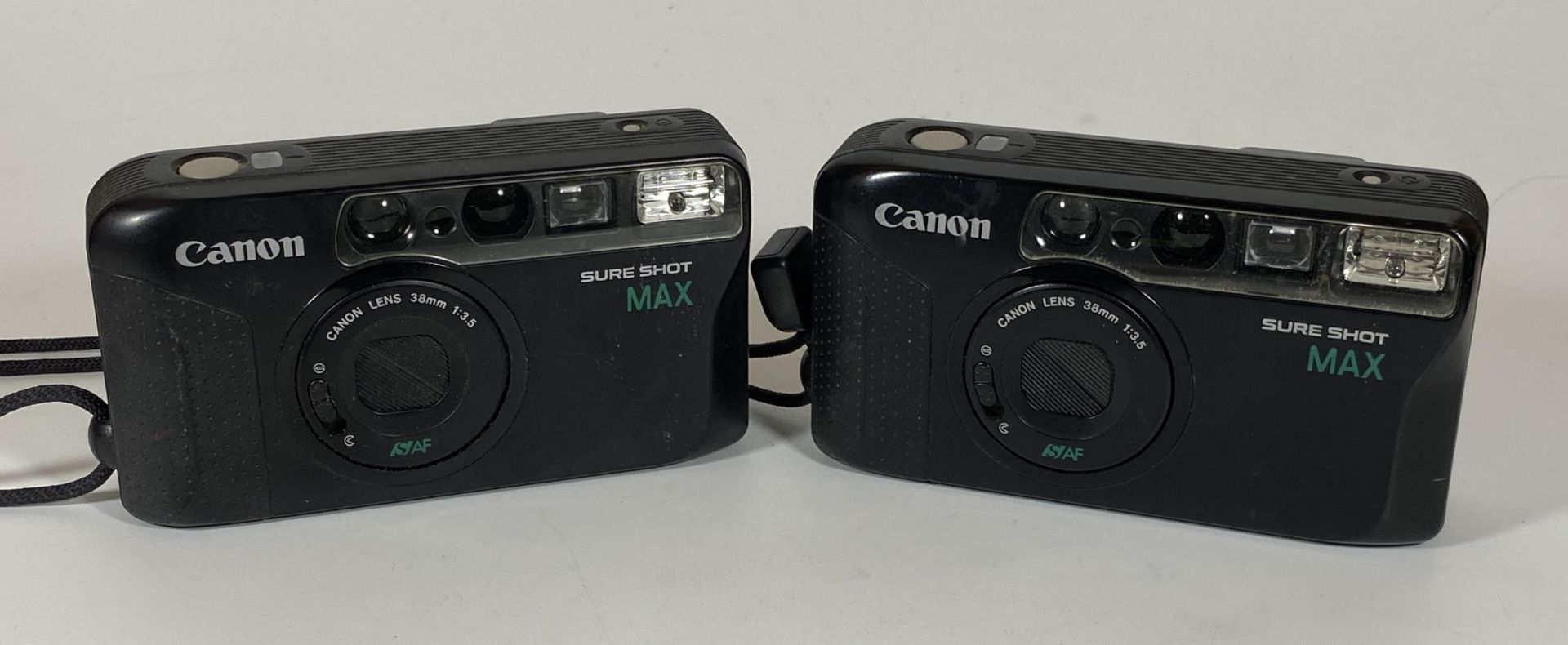 TWO CANON SURESHOT MAX 38MM CAMERAS