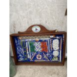 AN OAK FRAMED GLASS DISPLAY CASE SHOWING AN ASSORTMENT OF VARIOUS ROPE KNOTS