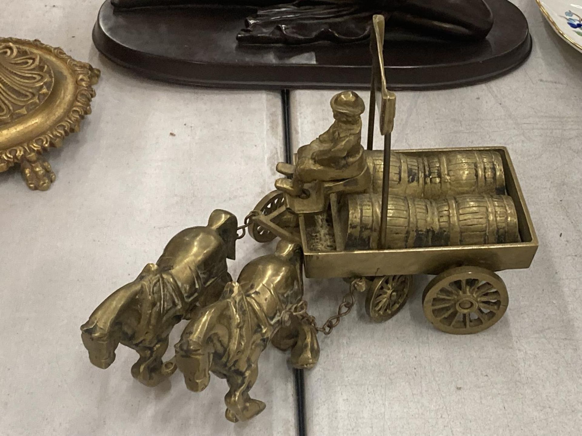 A HEAVY BRASS MODEL OF SHIRE HORSES PULLING A DRAY