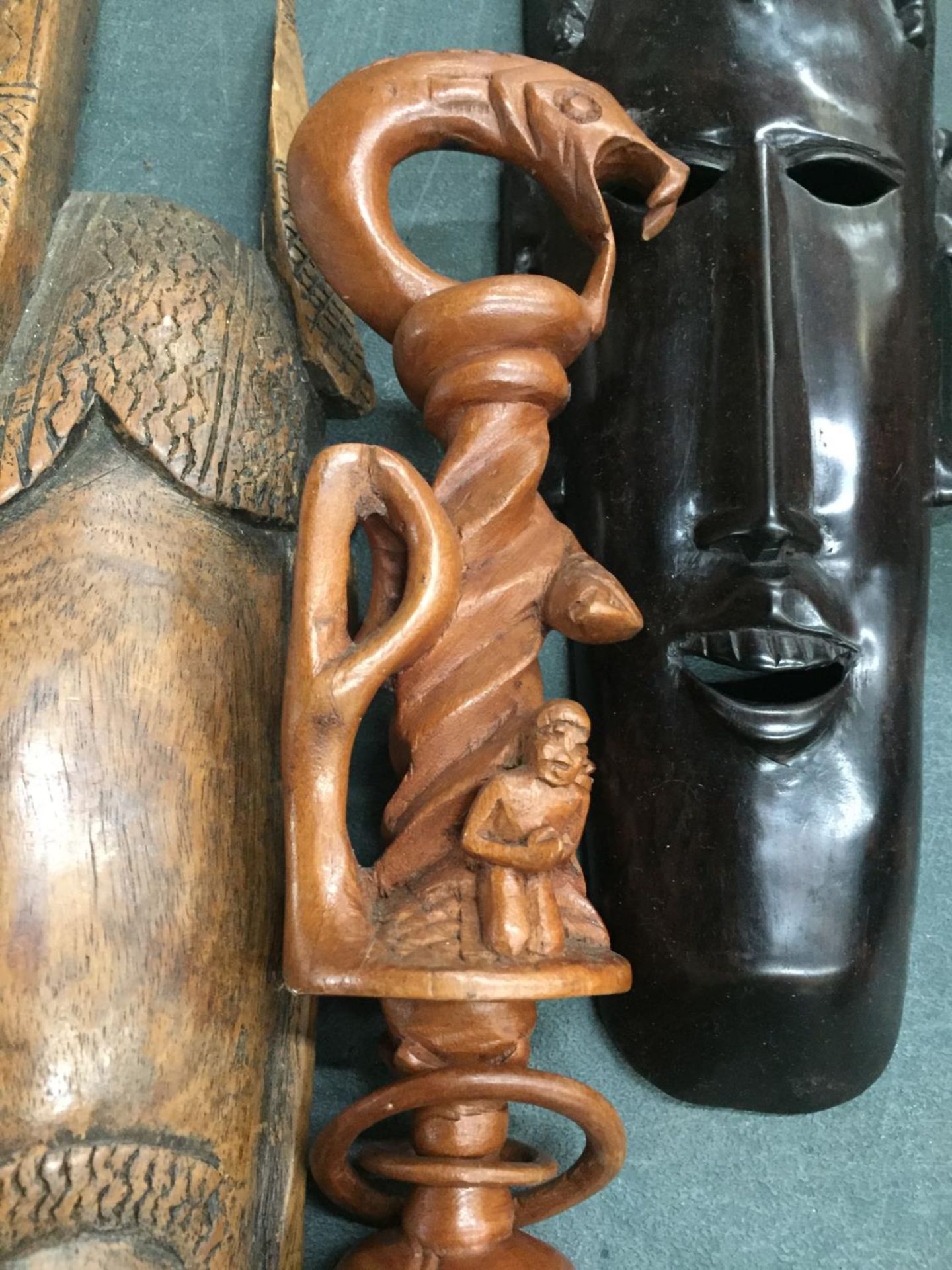 TWO AFRICAN STYLE FACE MASKS PLUS A TRIBAL STYLE CARVED STICK WITH SERPENT DESIGN - Image 3 of 4