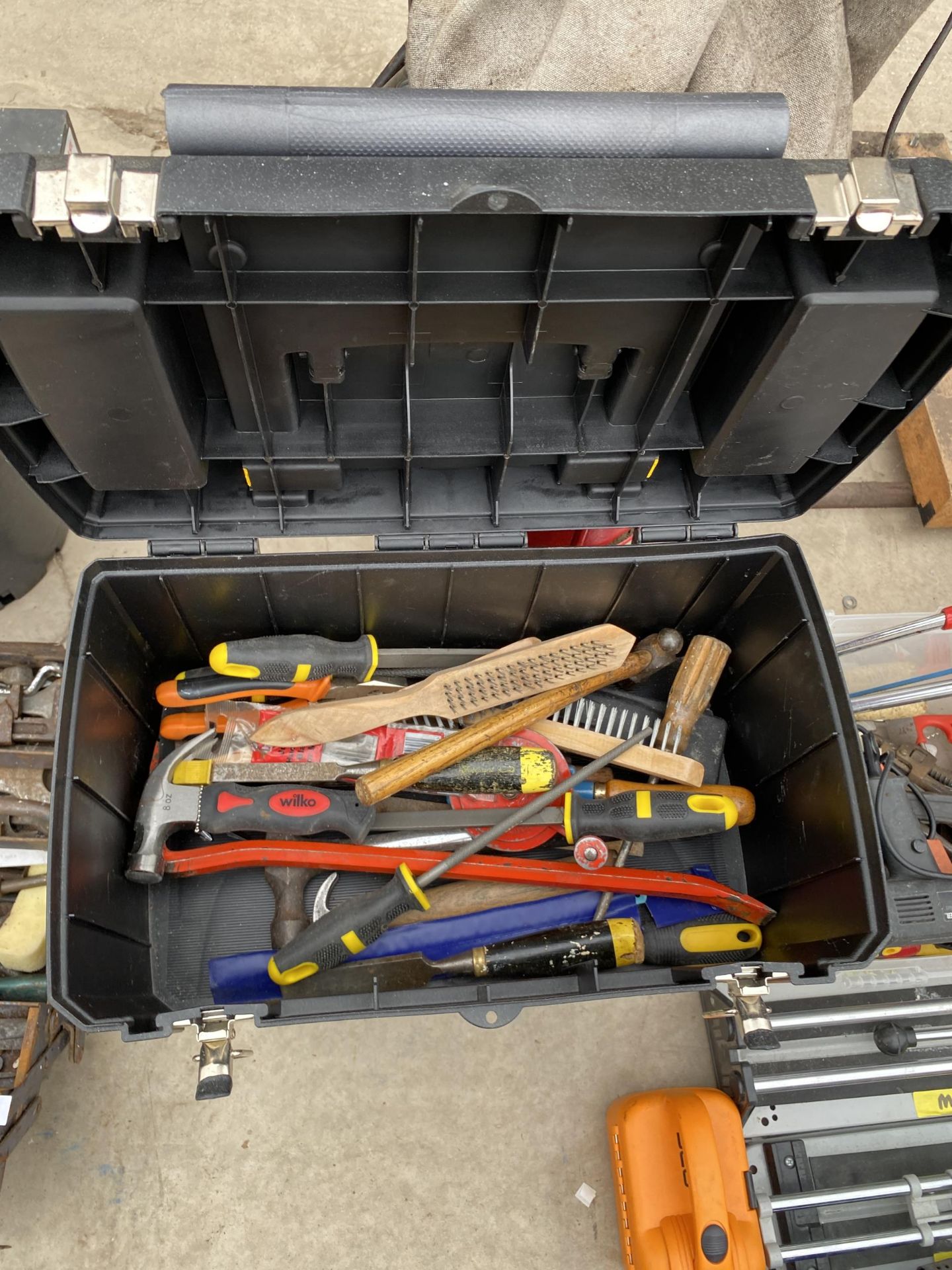 A PLASTIC STANLEY STACKING TOOL BOX WITH TROLLEY WHEELS AND AN ASSORTMENT OF TOOLS TO INCLUDE FILES, - Image 3 of 3