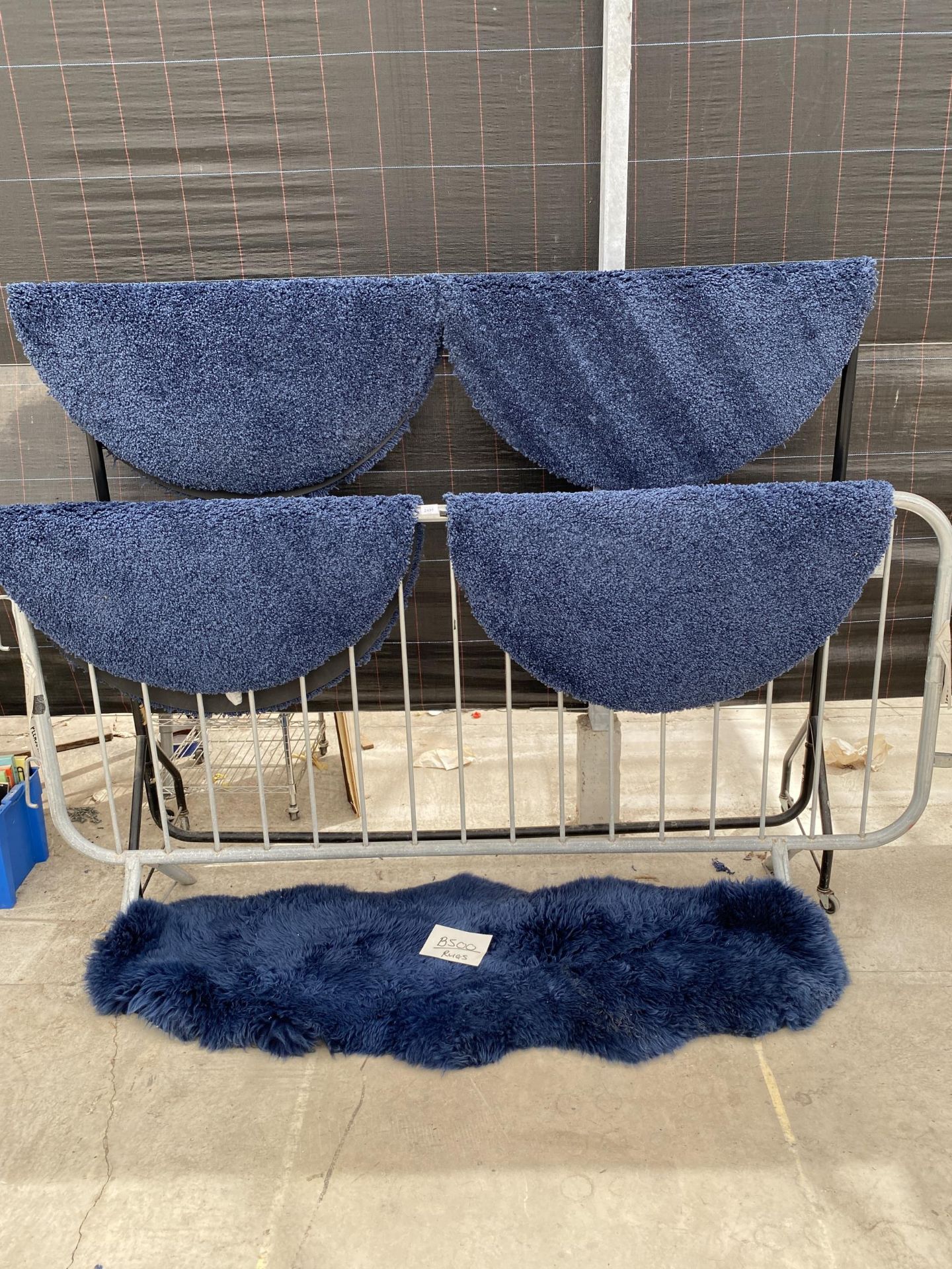 FIVE VARIOUS BLUE SHAGGY RUGS