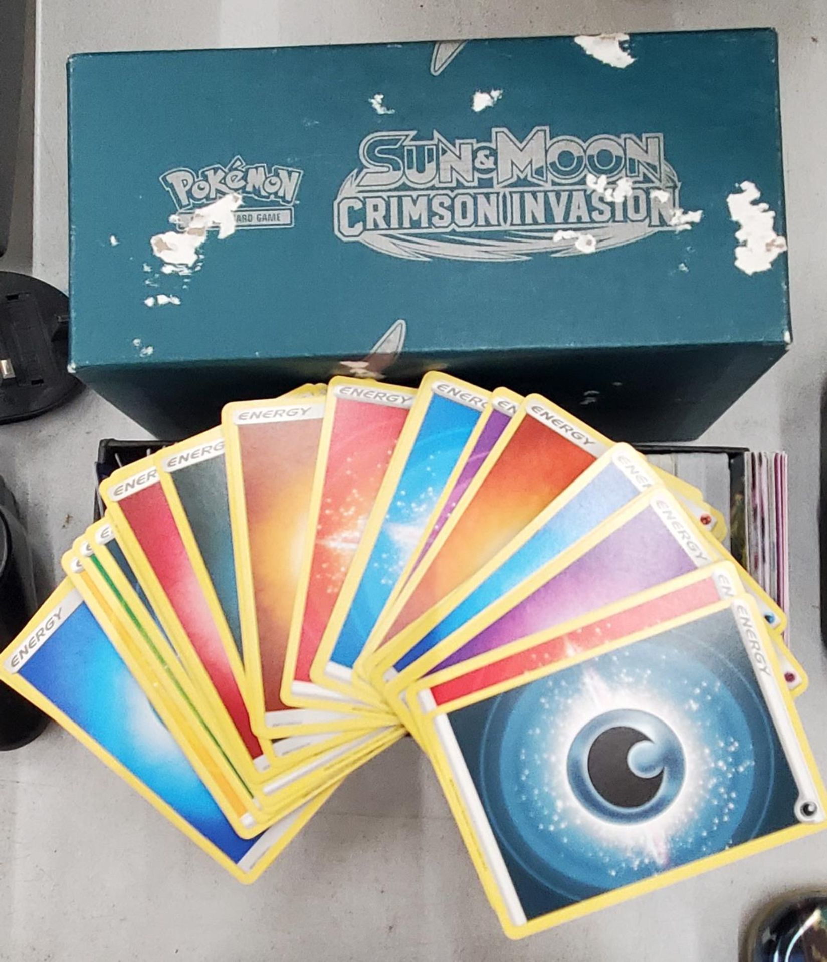 A POKEMON SUN AND MOON CRIMSON INVASION ELITE TRAINER BOX FULL OF CARDS INCLUDING HOLOS, ETC