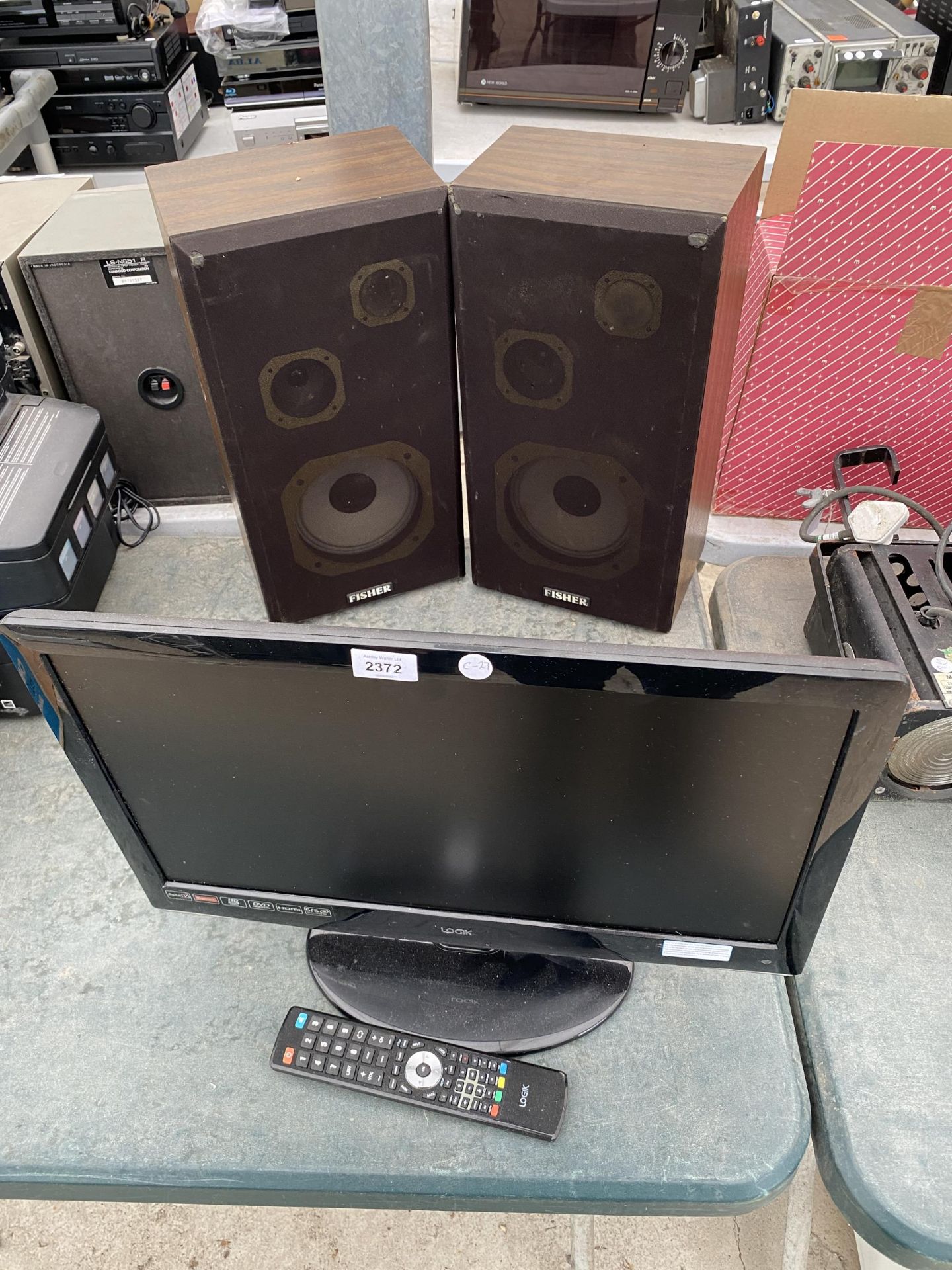 A LOGIK 22" TELEVISION, A PAIR OF WOODEN CASED FISHER SPEAKERS AND A CHINON 6000 AUTO SLIDE