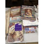 A LARGE QUANTITY OF NEEDLEPOINT AND EMBROIDERY BOOKS