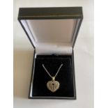 A SILVER NECKLACE WITH MUM PENDANT IN A PRESENTATION BOX