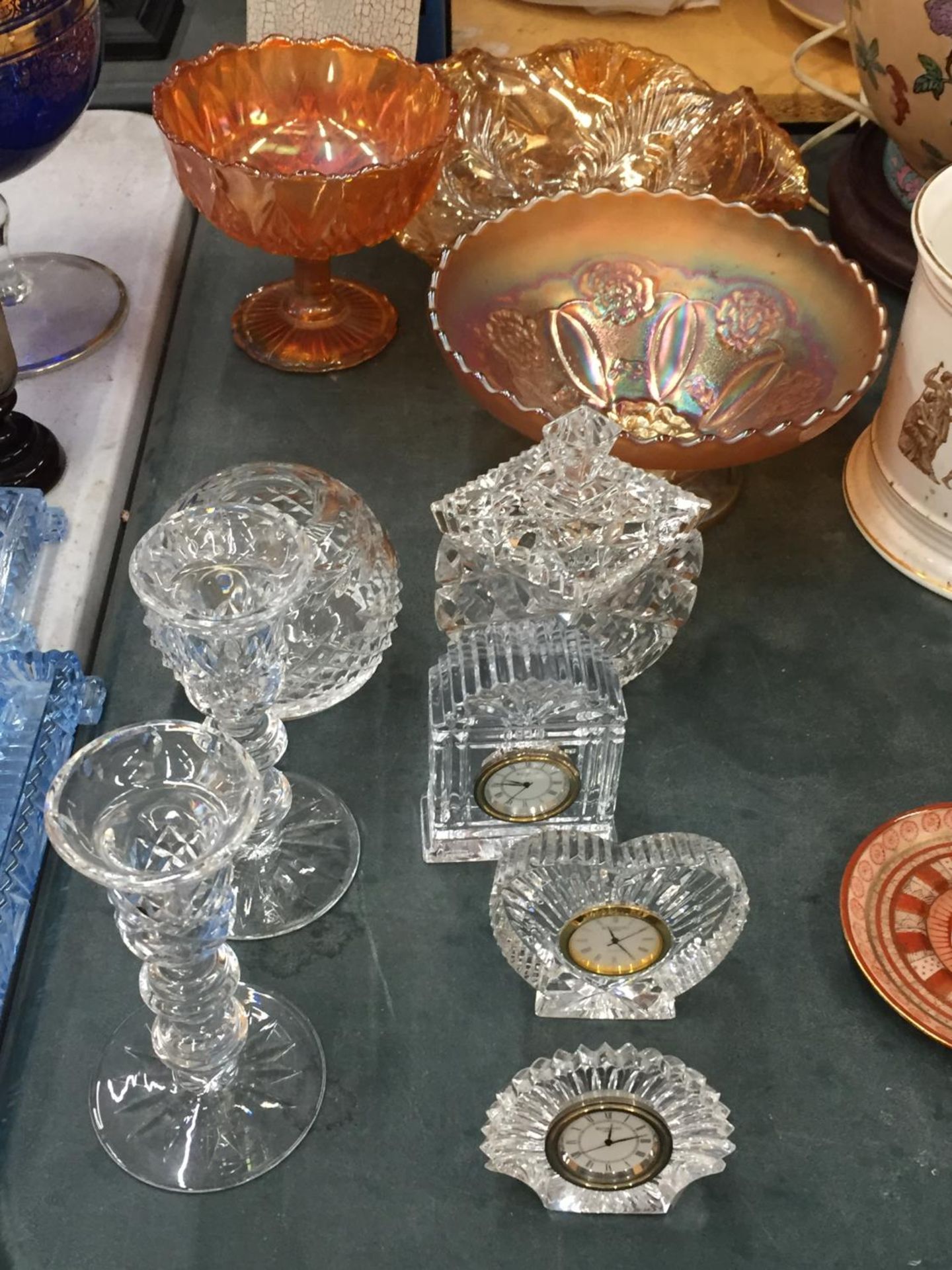 THREE WATERFORD CRYSTAL MINIATURE CLOCKS, WATERFORD PAIR OF CANDLESTICKS AND CARNIVAL GLASS DISHES