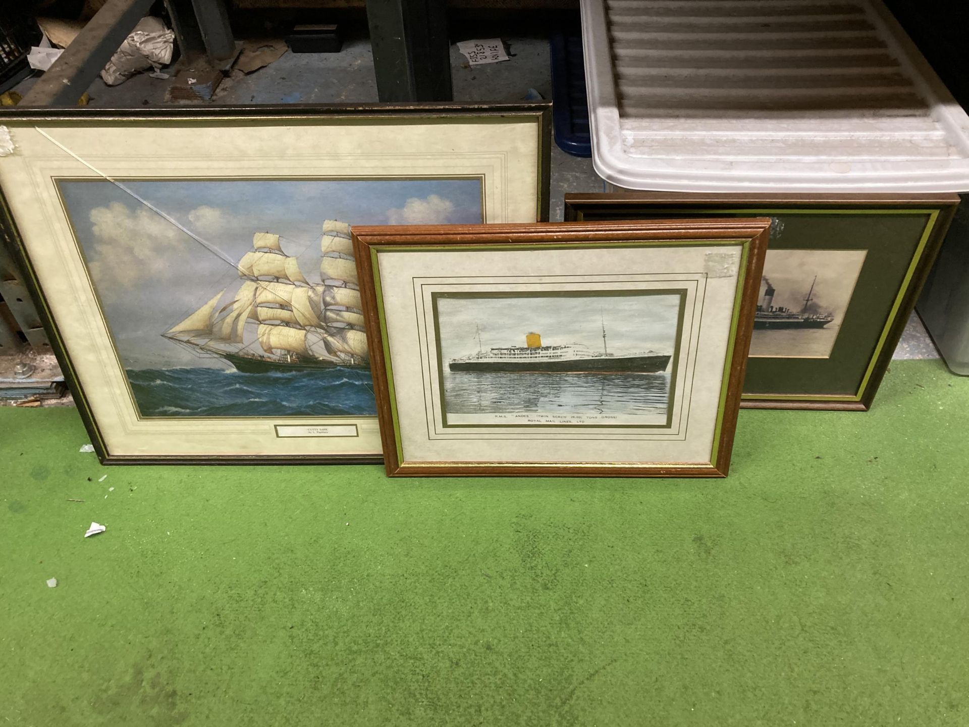 A GROUP OF THREE FRAMED NAUTICAL SCENE PRINTS, R.M.S ANDES, CUTTY SARK AND OTHER