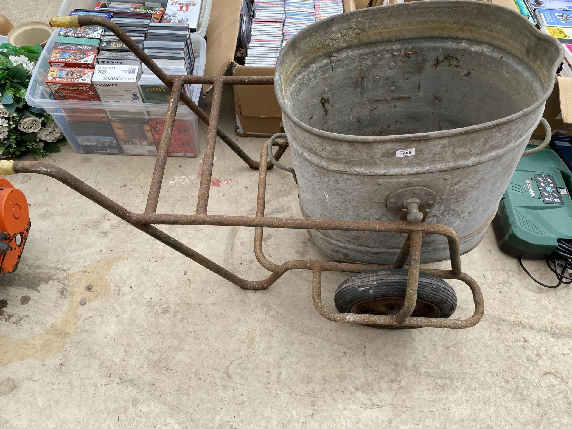 A GALVANISED TWO WHEELED SWILL TROLLEY