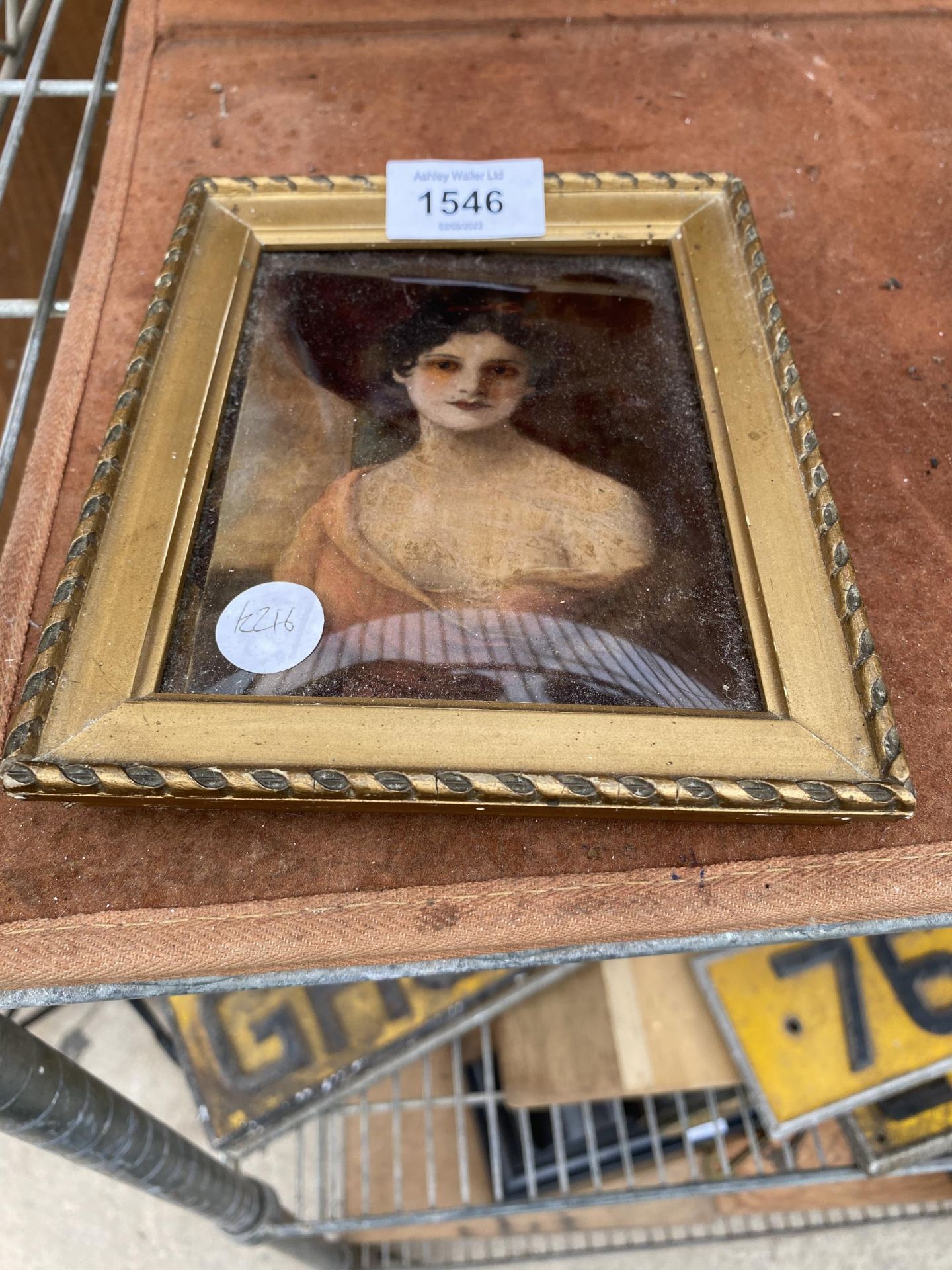 A VINTAGE FRAMED CRYSTOLEUM OF A FEMALE