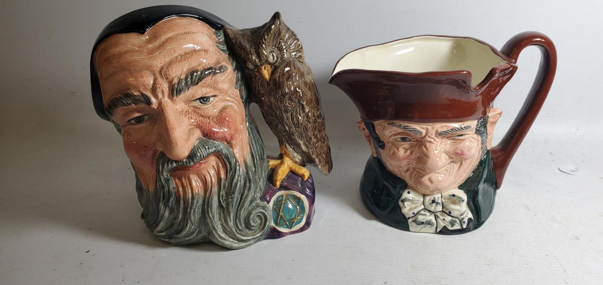 TWO LARGE ROYAL DOULTON TOBY JUGS - MERLIN AND OLD CHARLEY