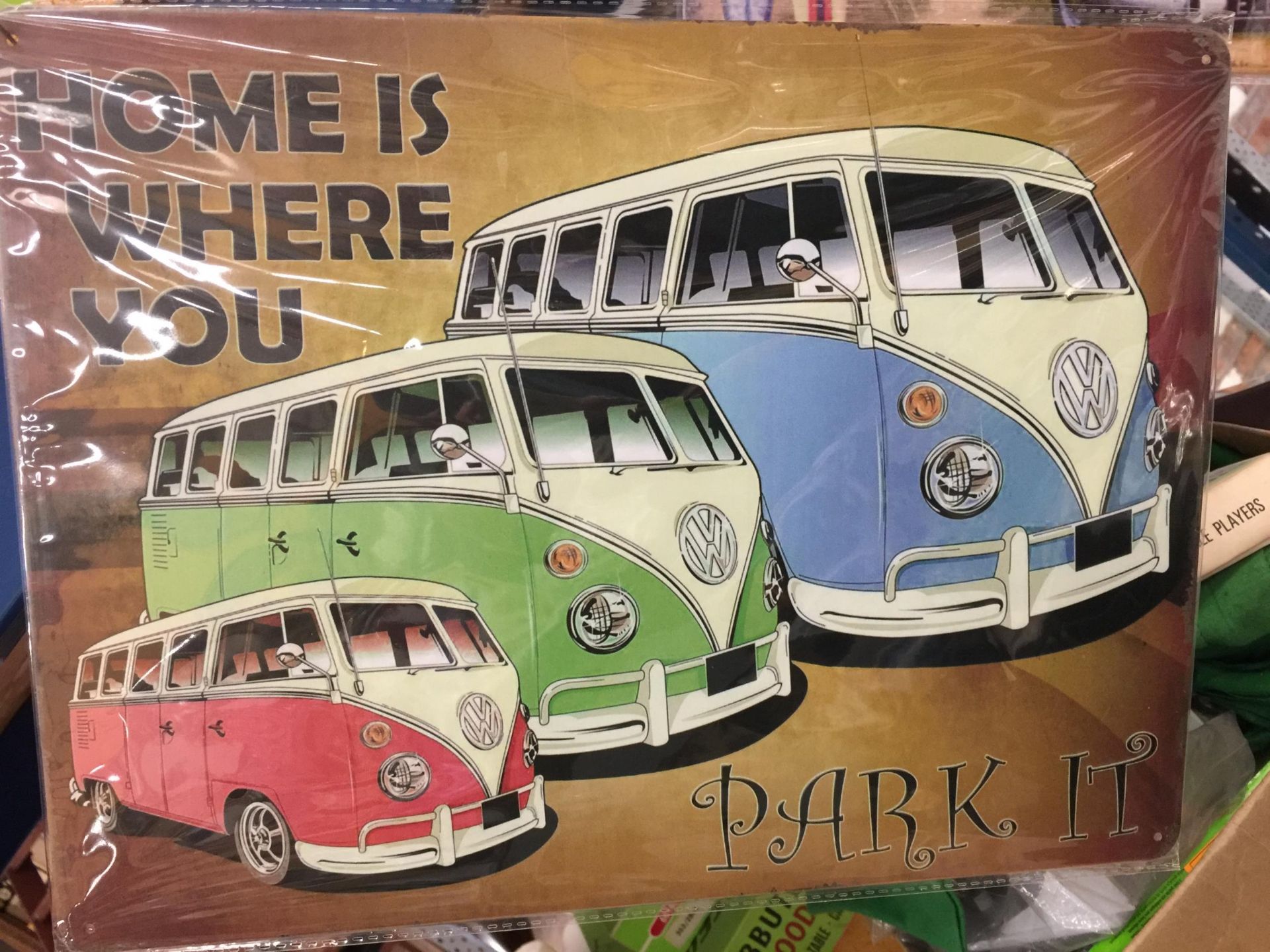 A VW TIN SIGN (HOME IS WHERE YOU PARK IT) 40CM X 30CM