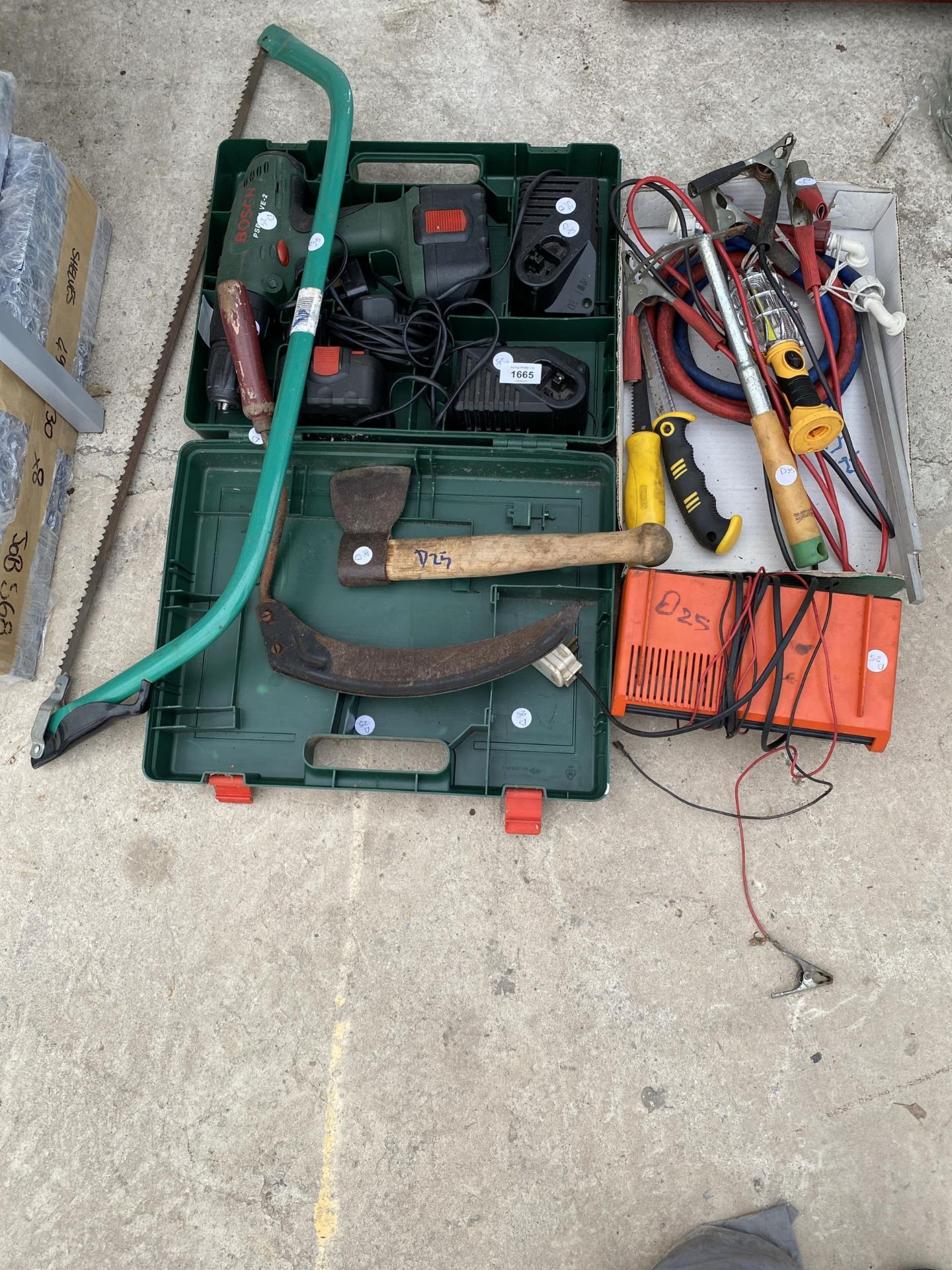 AN ASSORTMENT OF TOOLS TO INCLUDE A BOSCH BATTERY DRILL, JUMP LEADS AND AN AXE ETC