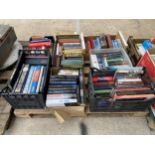 A LARGE ASSORTMENT OF BOOKS