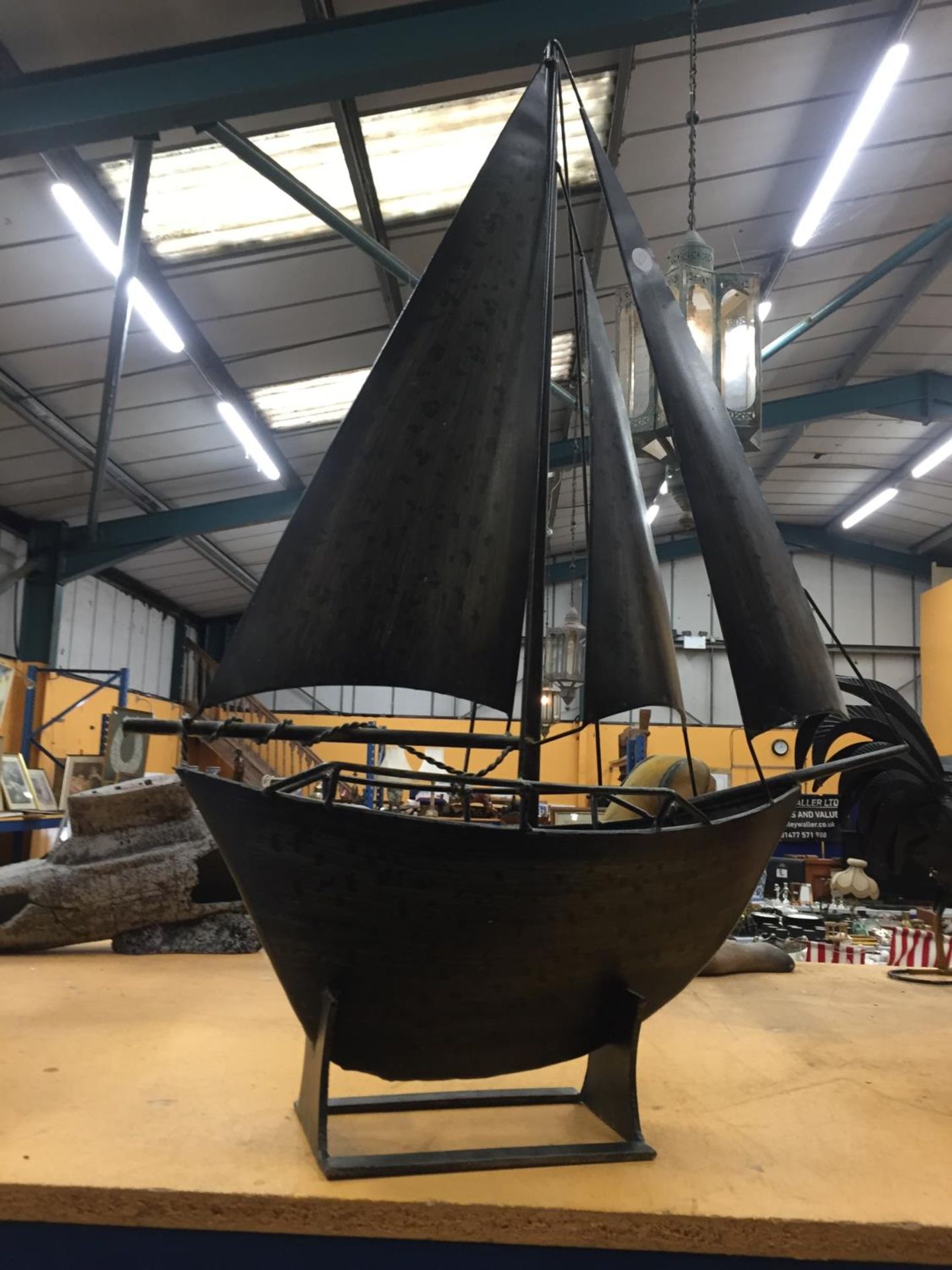 A LARGE METAL MODEL OF A SAILING BOAT, HEIGHT APPROX 78CM, WIDTH 58CM