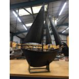 A LARGE METAL MODEL OF A SAILING BOAT, HEIGHT APPROX 78CM, WIDTH 58CM