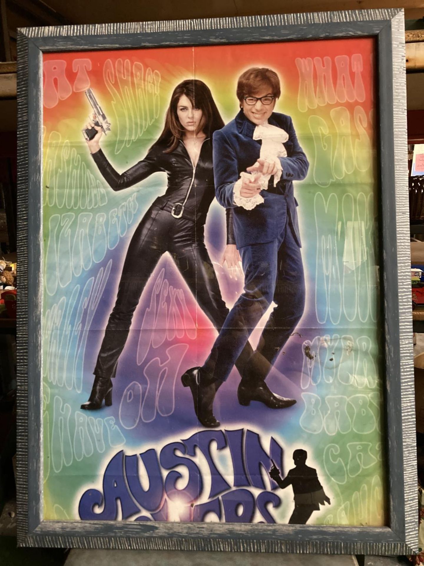 A FRAMED FILM POSTER OF AUSTIN POWERS