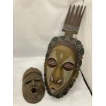 AN AFRICAN WOODEN WALL HANGING PLUS AN AFRICAN MASK