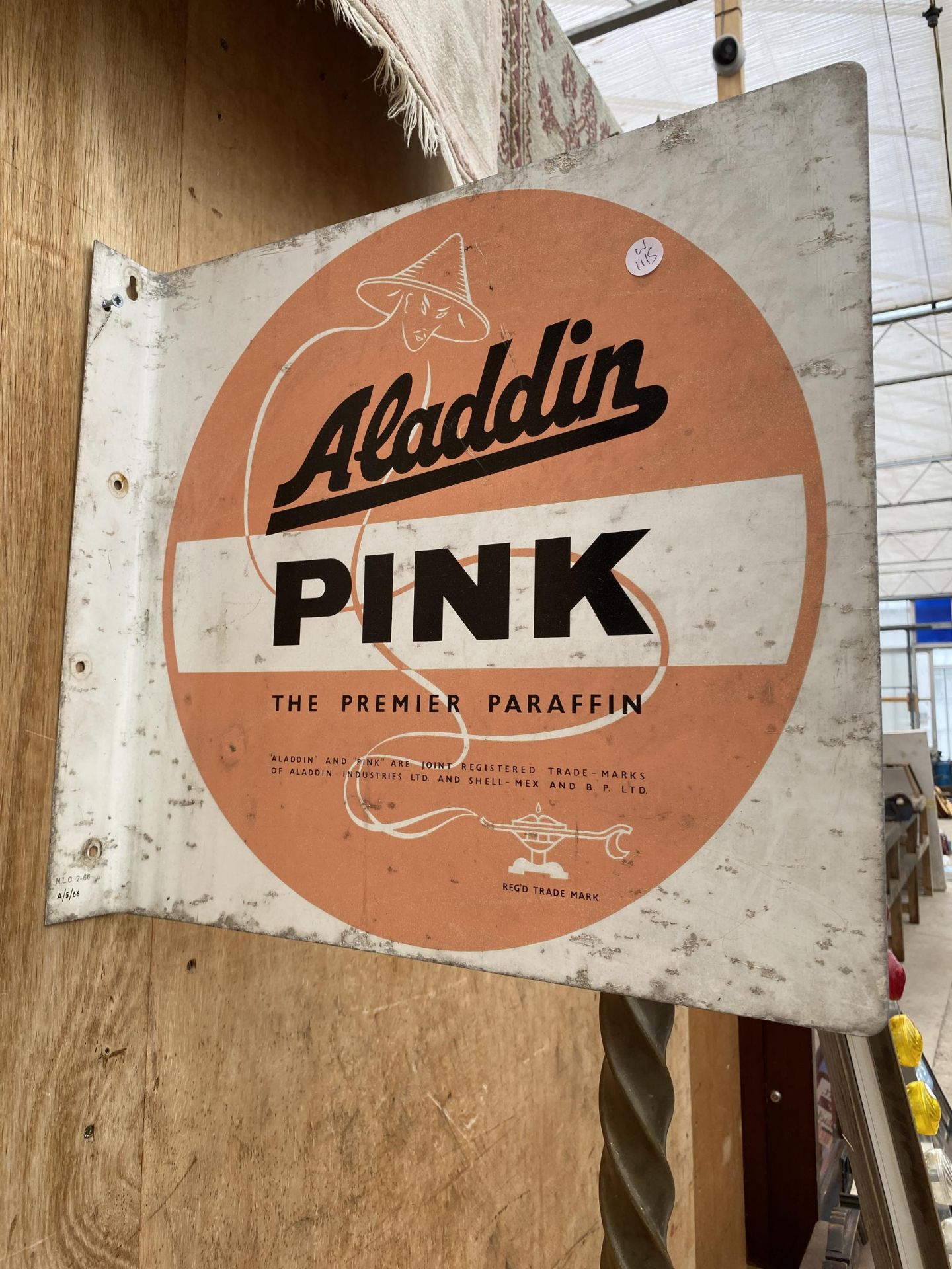 A BELIEVED ORIGINAL DOUBLE SIDED METAL 'ALADDIN PINK' PARAFIN SIGN