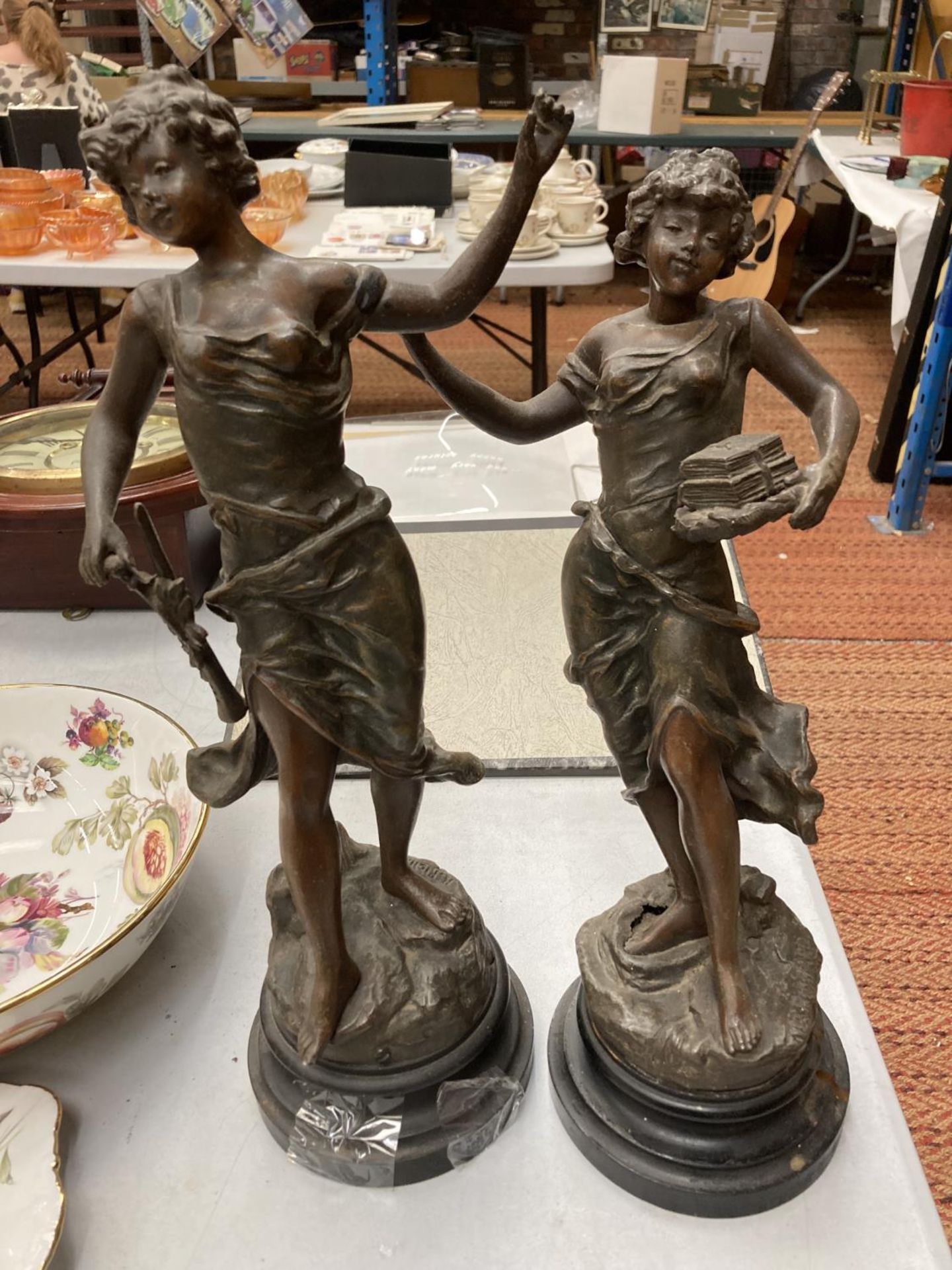 A PAIR OF VINTAGE METAL FIGURES ON WOODEN BASES OF YOUNG LADIES, SIGNED TO THE BASE R RICHARD,