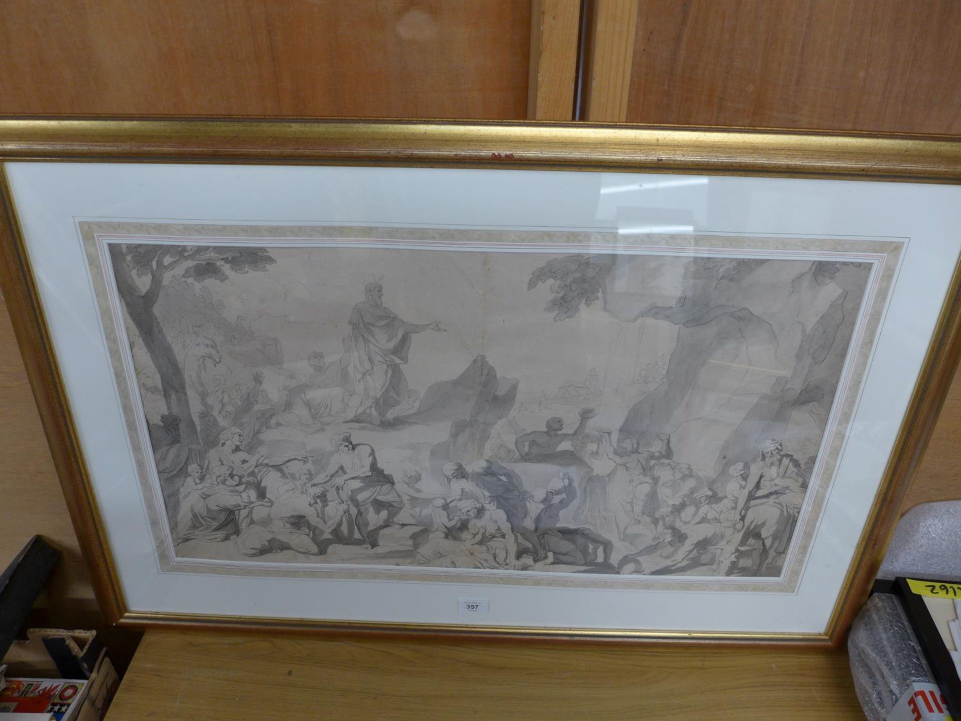 AN ANTIQUE PEN AND INK DRAWING OF MOSES STRIKING THE ROCK TO BRING FORTH WATER, 42X76CM, FRAMED