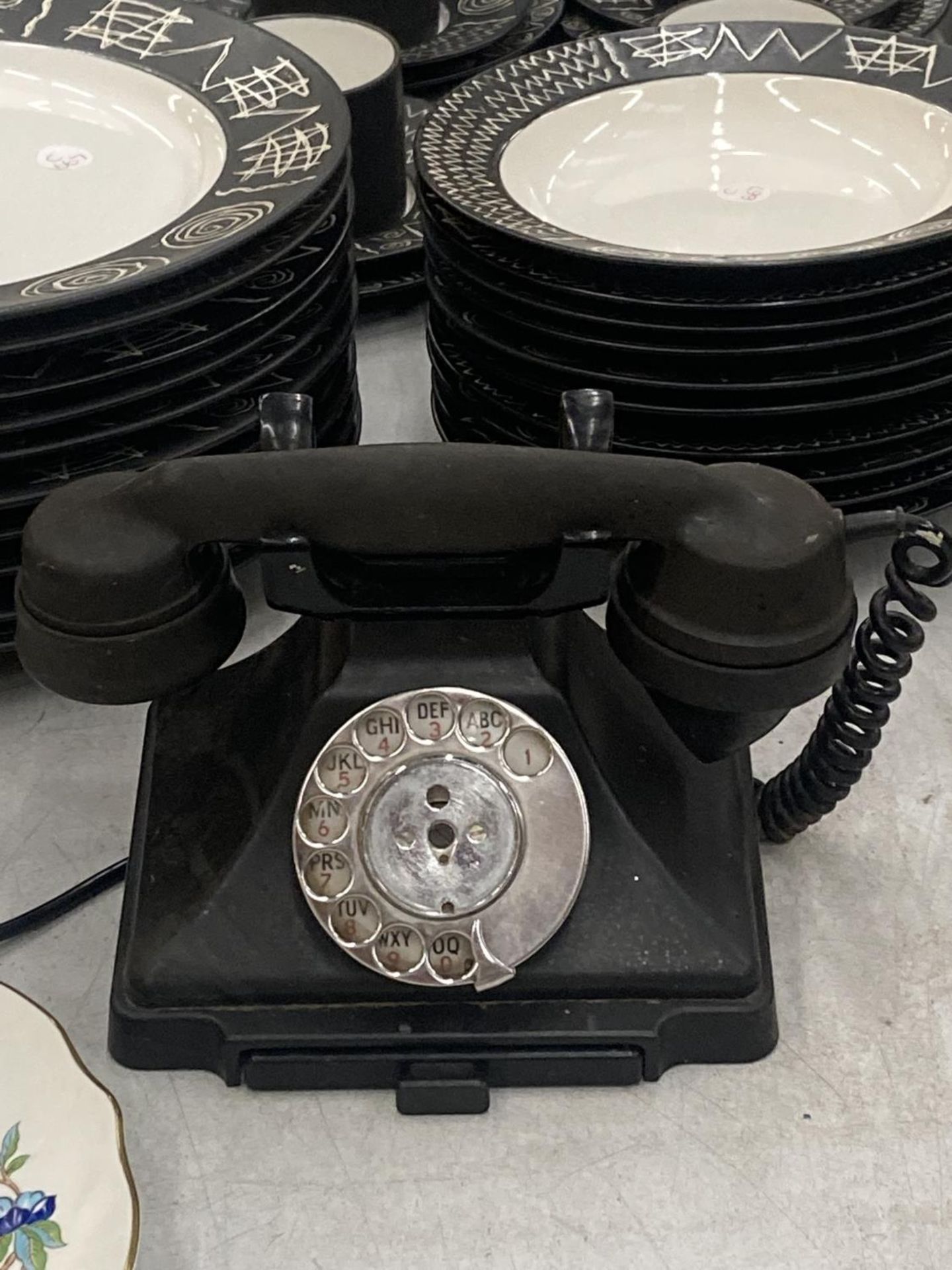 A VINTAGE BAKELITE TELEPHONE WITH DRAWER