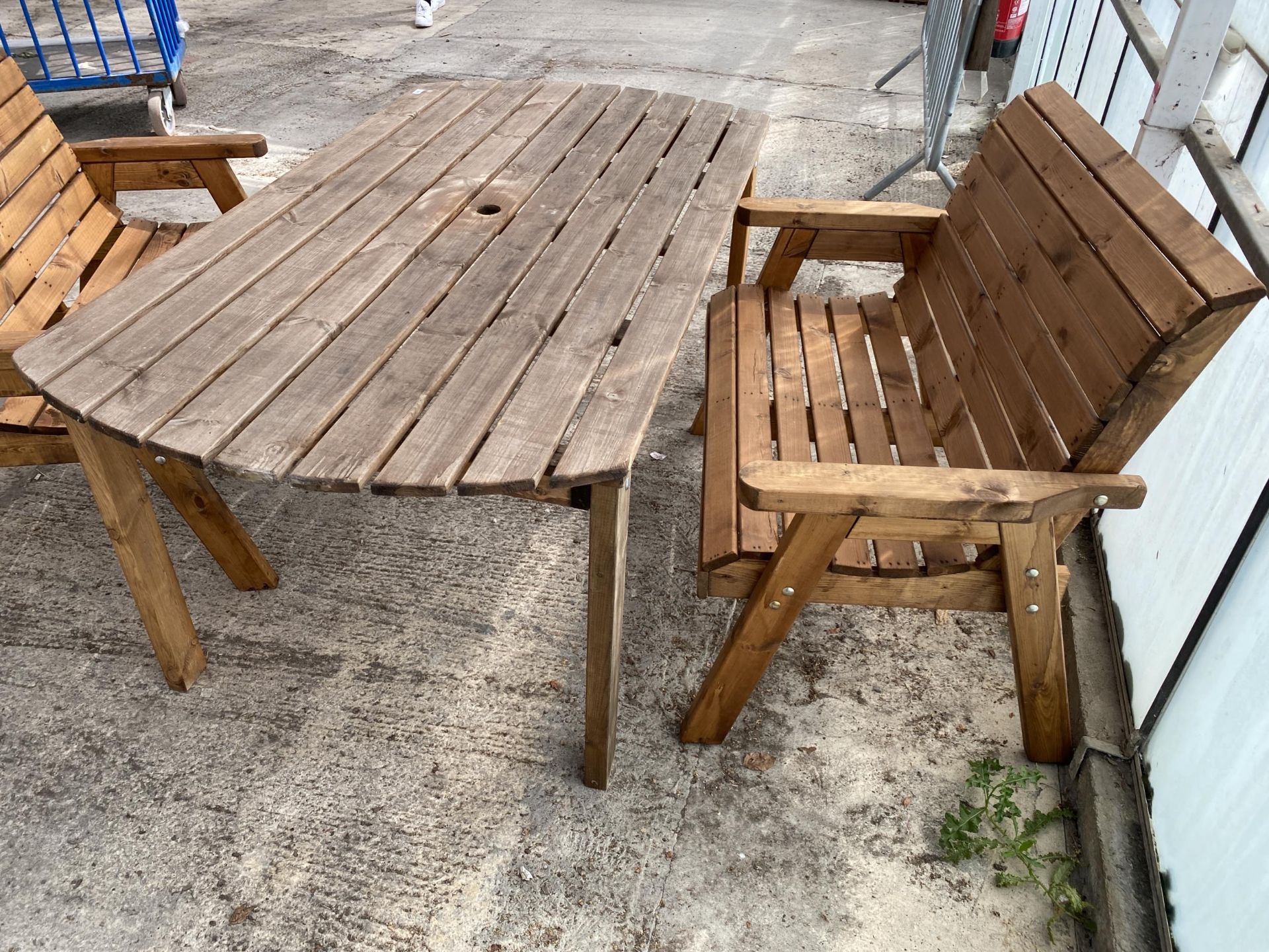 AN AS NEW EX DISPLAY CHARLES TAYLOR GARDEN TABLE, AND A PAIR OF TWO SEATER BENCHES *PLEASE NOTE - Image 3 of 3