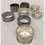 A COLLECTION OF EIGHT ASSORTED HALLMARKED SILVER NAPKIN RINGS