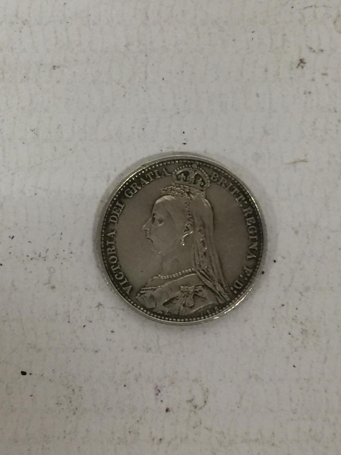 A VICTORIAN SILVER SIXPENCE 1887