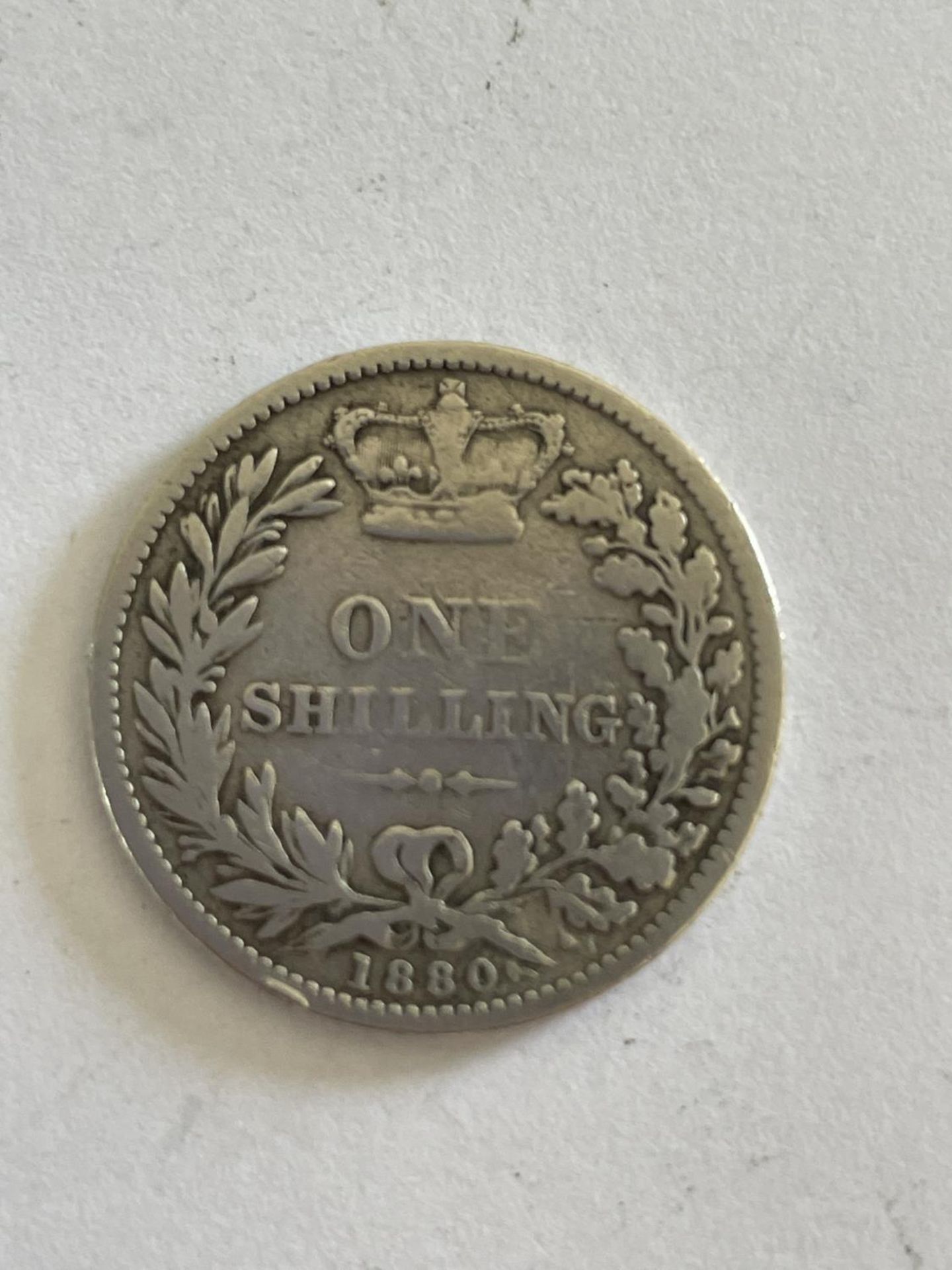 A VICTORIAN SILVER SHILLING 1880