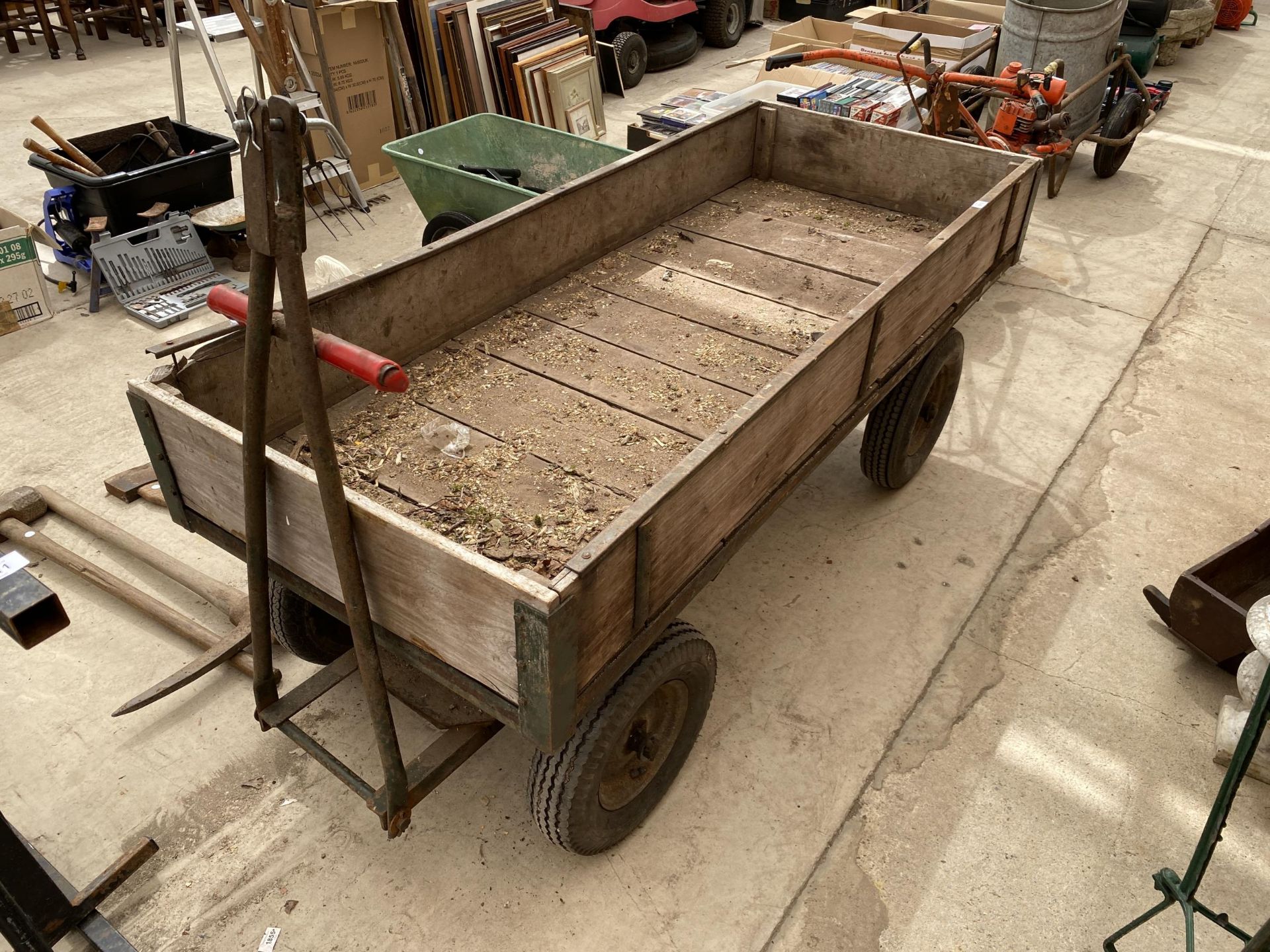 A LARGE FOUR WHEELED MARKET GARDENERS TRAILER/TROLLEY