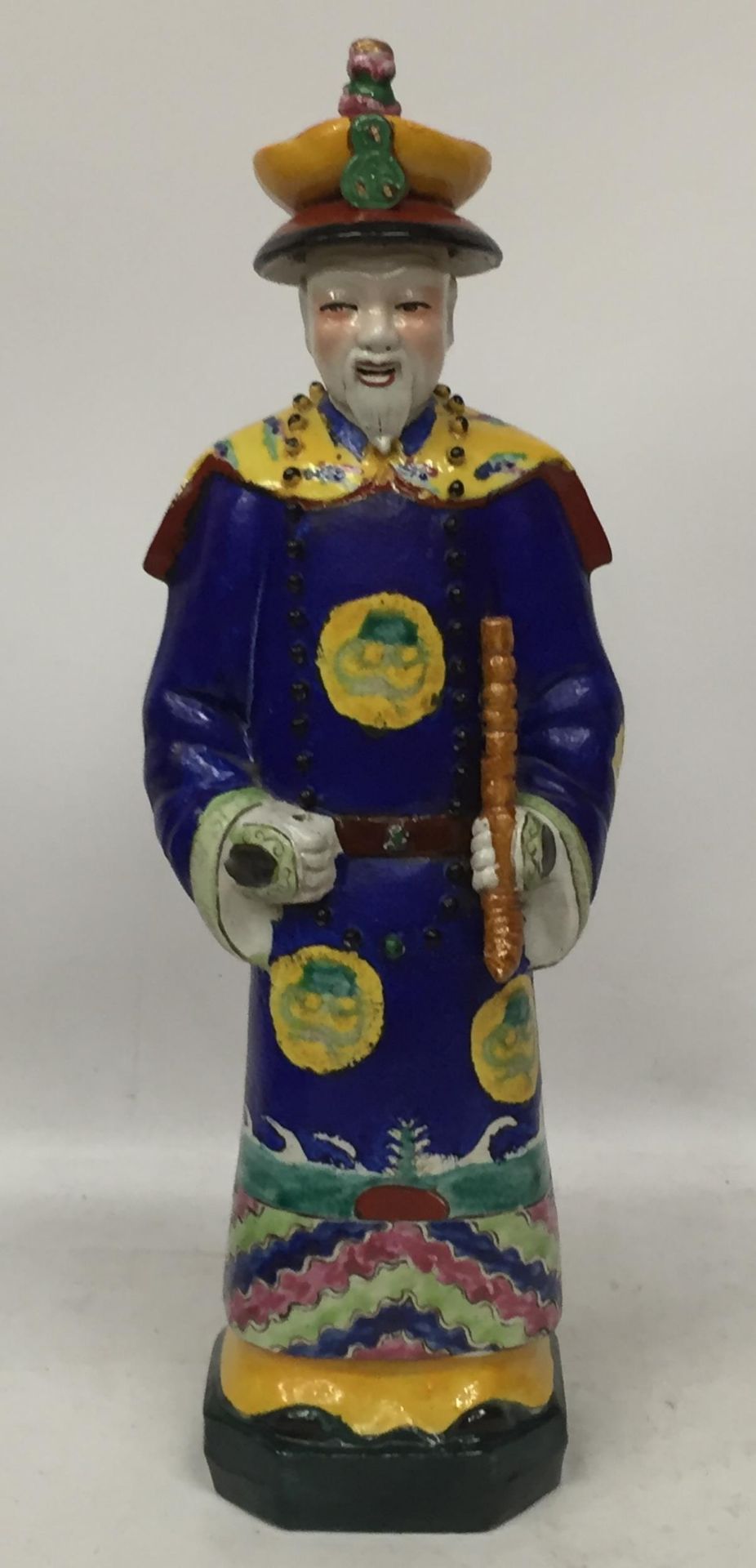 A CHINESE STONEWARE FIGURE WITH SEAL MARK TO BASE