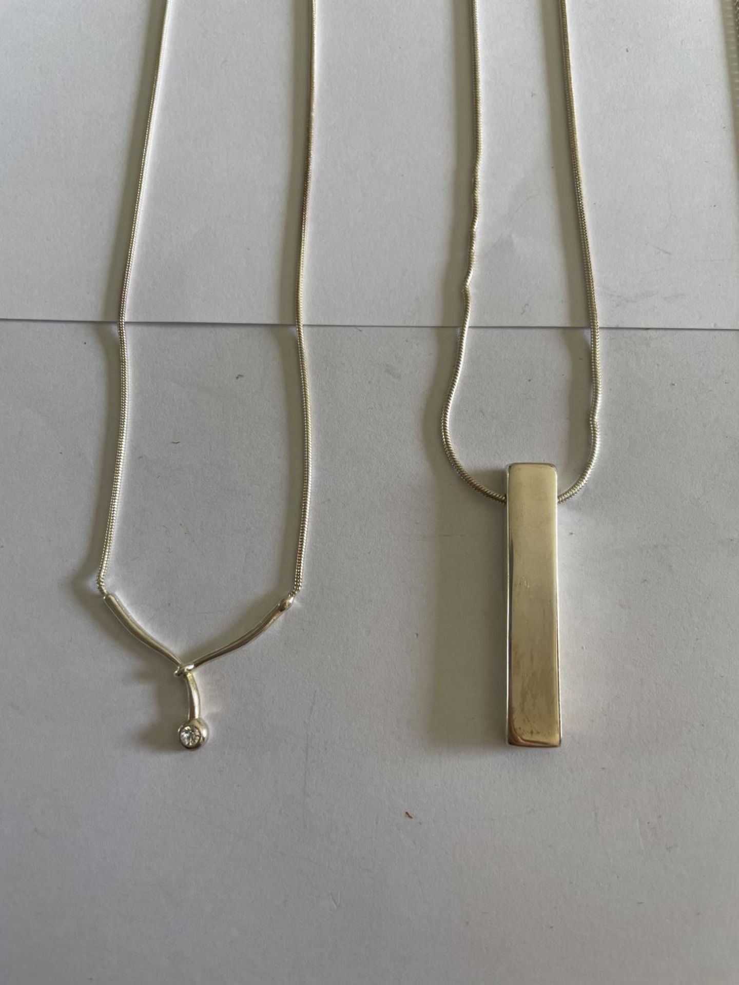 FOUR SILVER NECKLACES WITH PENDANTS - Image 2 of 3