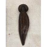 A VINTAGE CARVED WOODEN LETTER OPENER IN THE GUISE OF A HOLY MAN