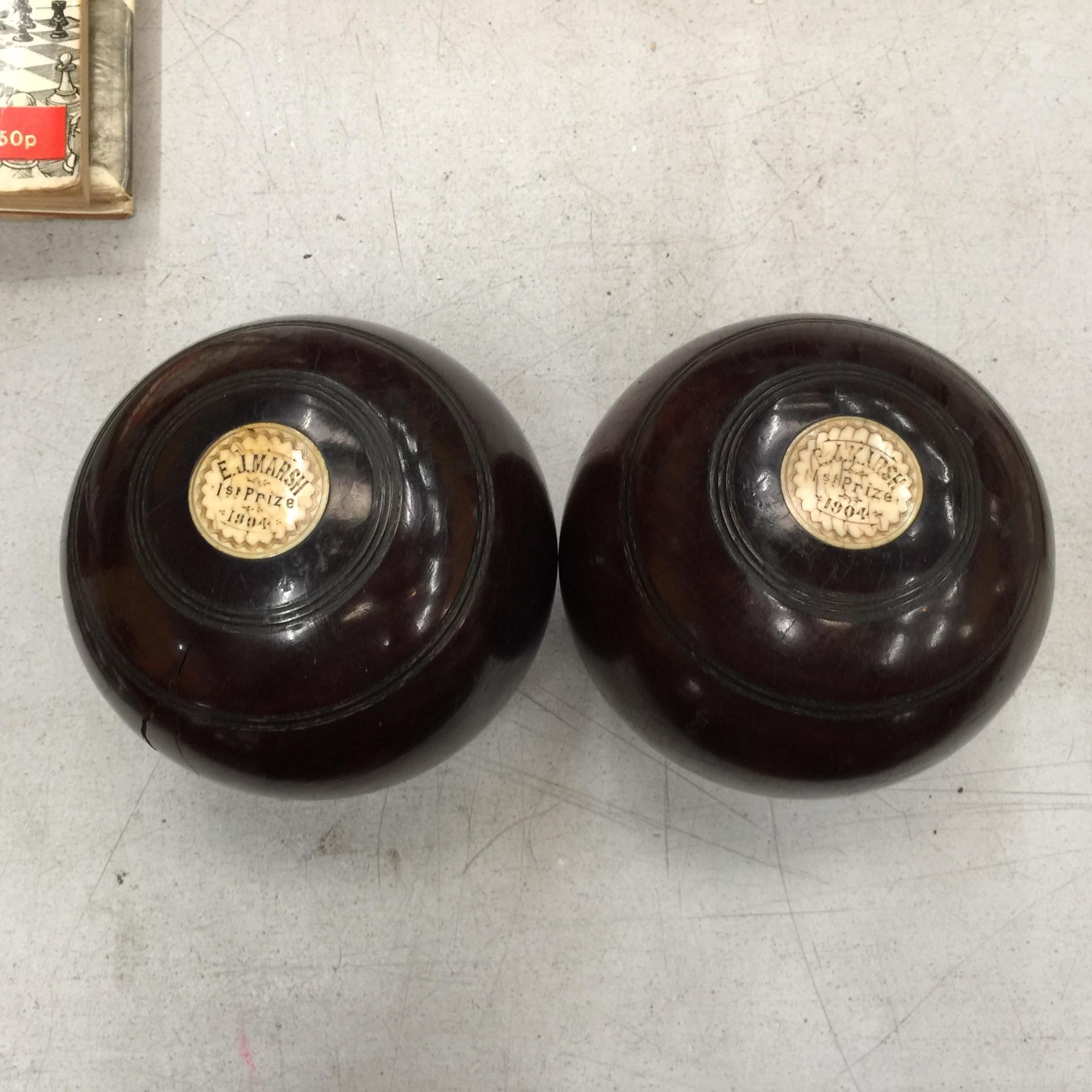 A PAIR OF VINTAGE BOWLS DATED 1894 AND 1904