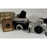 THREE VINTAGE CAMERAS - CASED KODAK BROWNIE FLASH IV, YASHICA MINISTER-D FITTED WITH 45MM LENS AND A