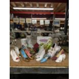 A GROUP OF CERAMIC SHOES ETC