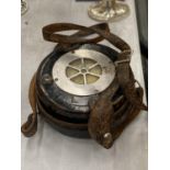 A VINTAGE TIME AND MOTION FACTORY CLOCK WITH LEATHER CASING