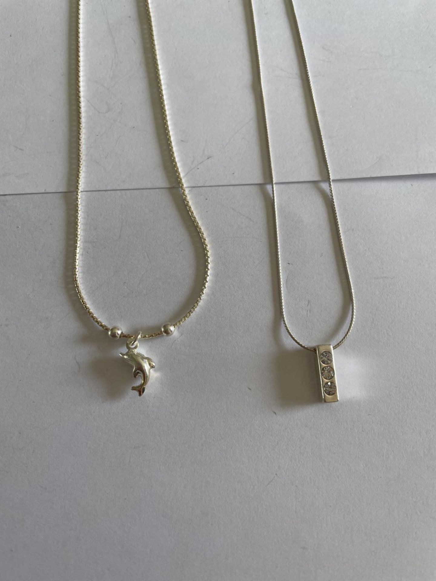 FOUR SILVER NECKLACES WITH PENDANTS - Image 3 of 3