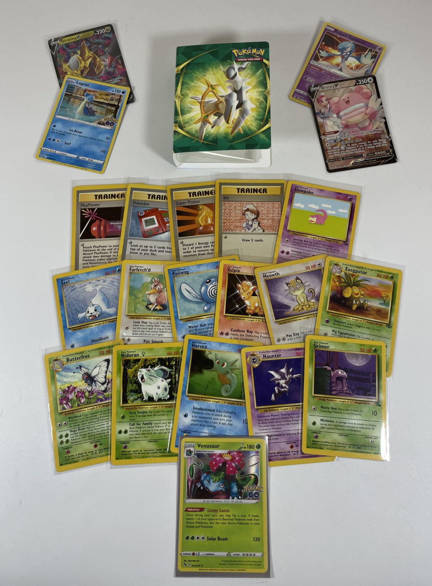 A SMALL FOLDER OF 1999 & LATER WOTC POKEMON CARDS, BASE SET, HOLOS ETC