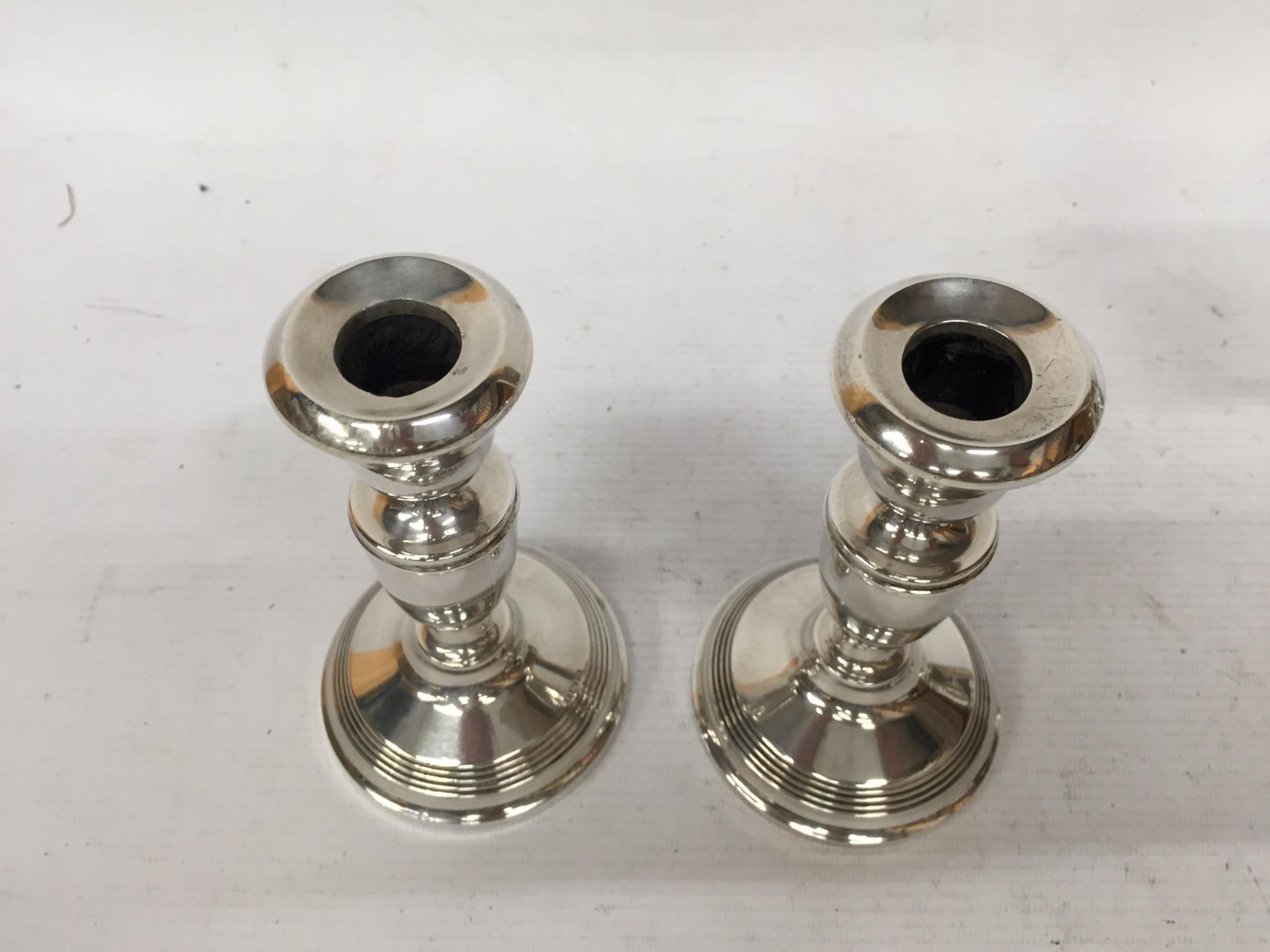 A PAIR OF HALLMARKED SILVER CANDLESTICKS, (WEIGHTED BASES) - Image 2 of 3