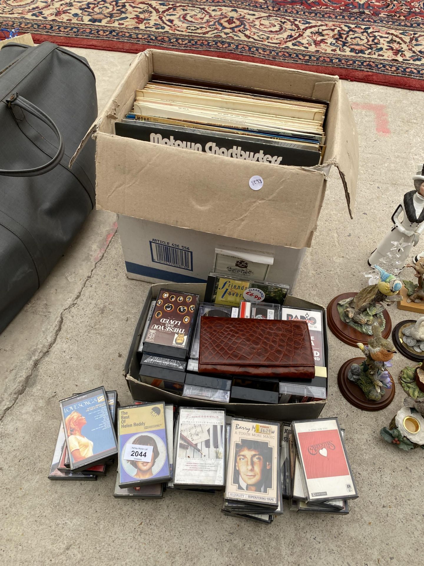 AN ASSORTMENT OF LP RECORDS AND CASSETTES