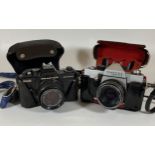 TWO VINTAGE CASED PRAKTICA CAMERAS - PRAKTICA BMS ELECTRONIC FITTED WITH CARL ZEISS JENA DDR 50MM,