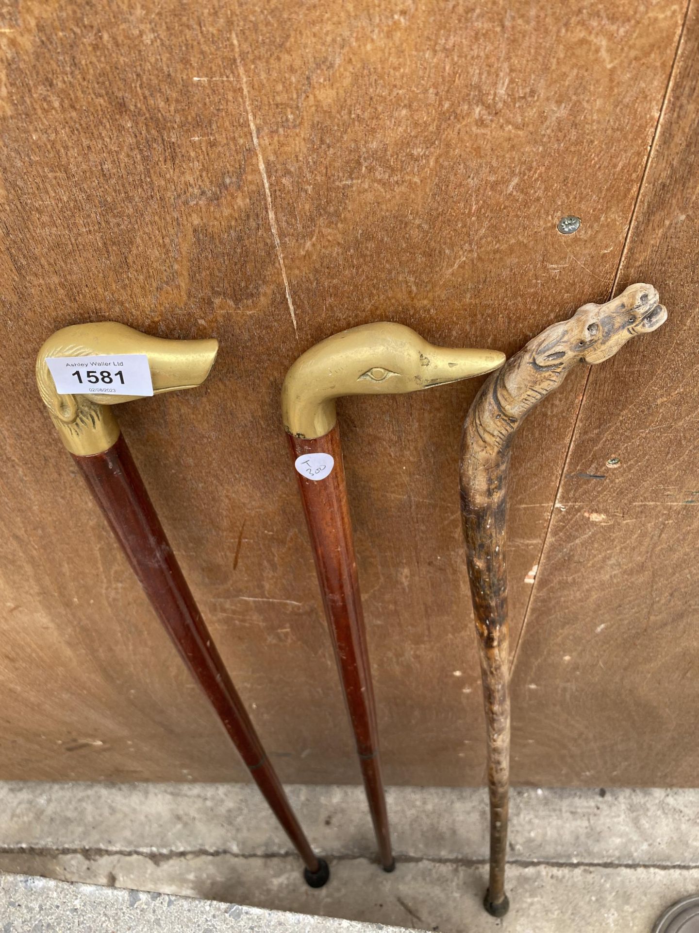 THREE VINTAGE WALKING STICKS TO INCLUDE TWO WITH BRASS DUCK HEAD HANDLES