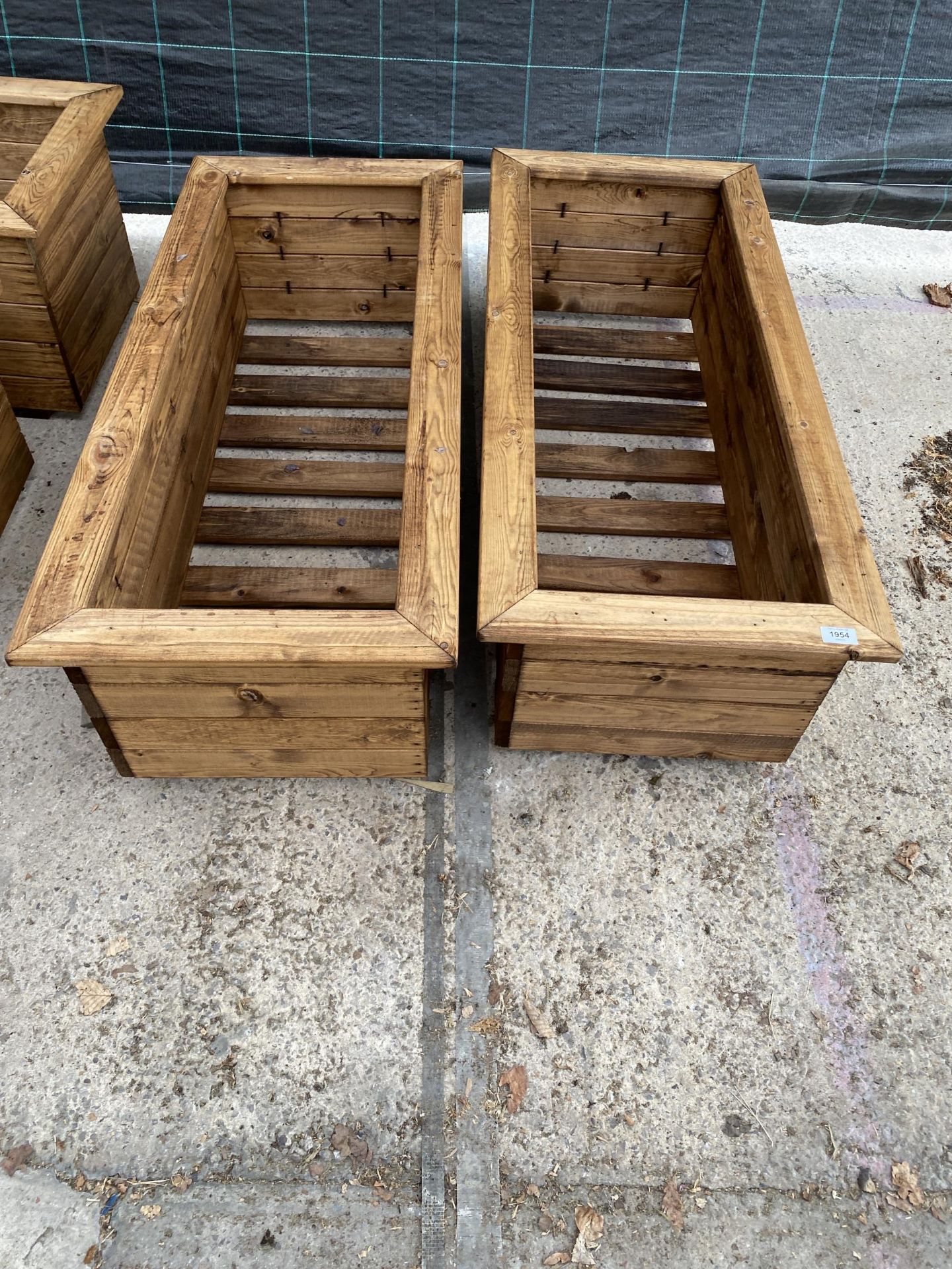 AN AS NEW EX DISPLAY CHARLES TAYLOR PAIR OF TROUGH PLANTERS *PLEASE NOTE VAT TO BE CHARGED ON THIS
