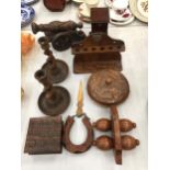 A COLLECTION OF TREEN TO INCLUDE CANDLESTICKS WITH TWISTED STEMS, A PIPE RACK, CANON, BOXES, PAGE