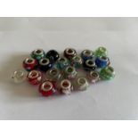 TWENTY SILVER RIMMED MURANO GLASS BEADS