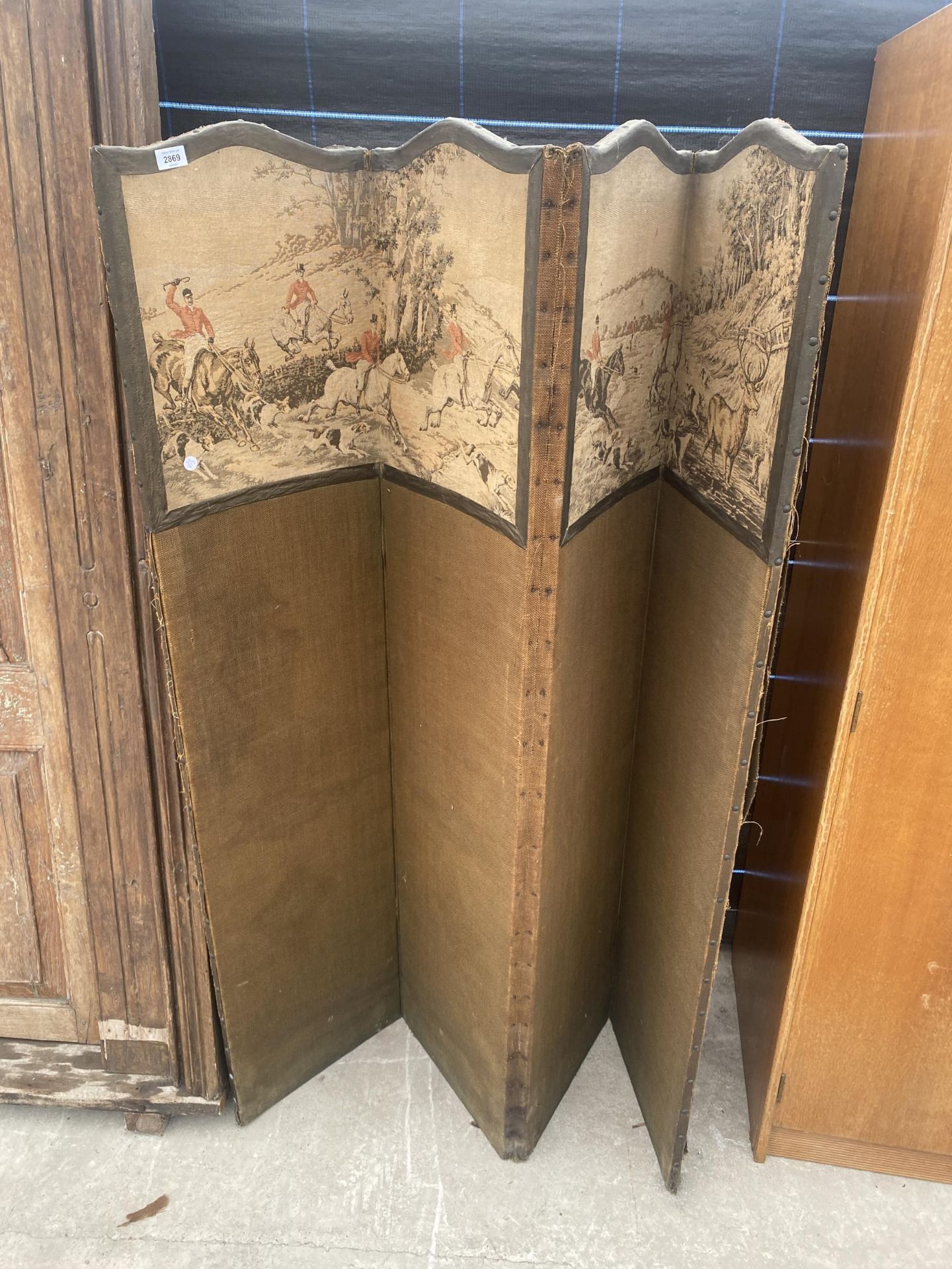 A FOUR DIVISION SCREEN DECORATED WITH HUNTING SCENES