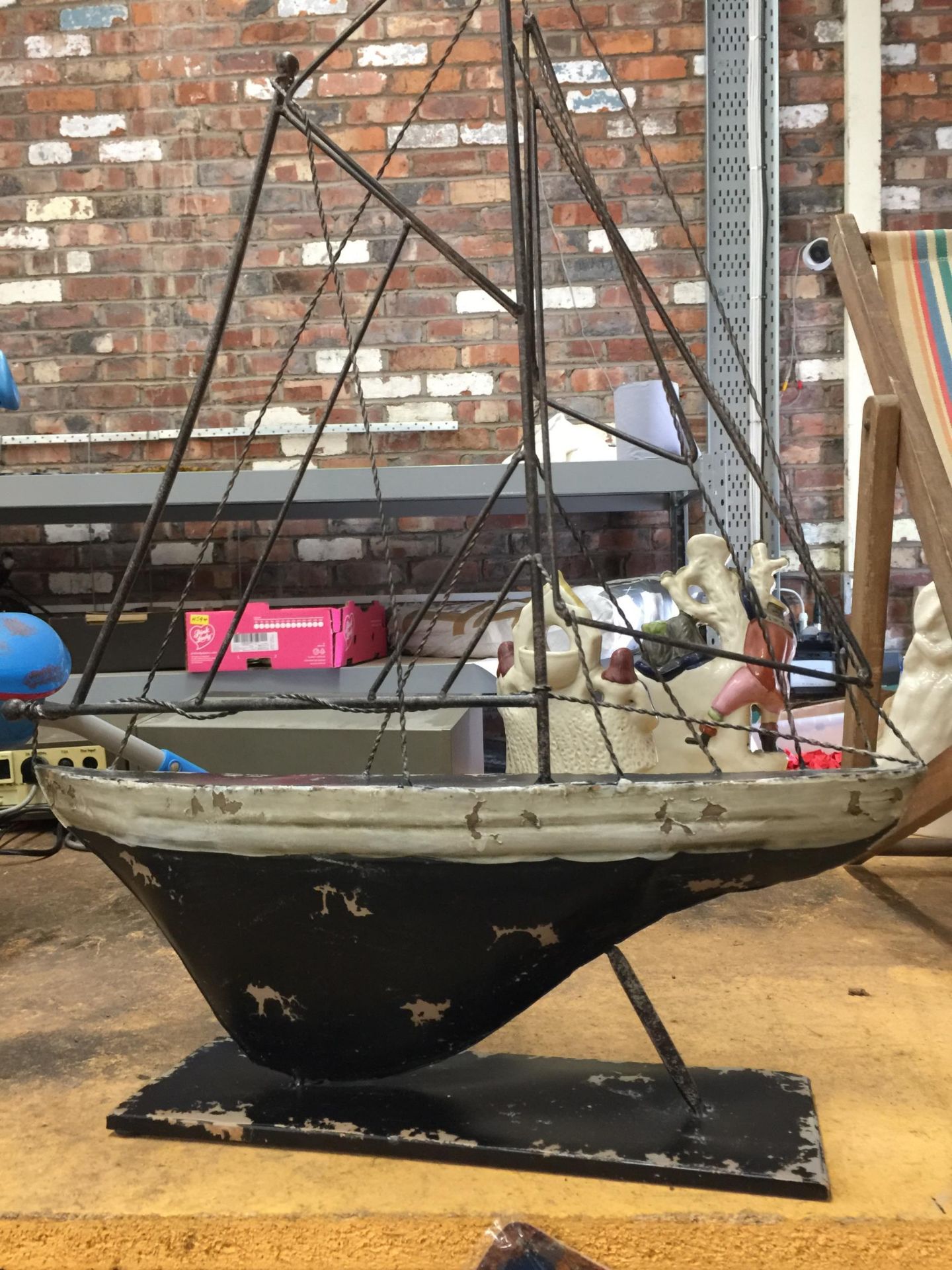 A VINTAGE STYLE METAL MODEL OF A YACHT WIDTH 46CM, HEIGHT 63CM